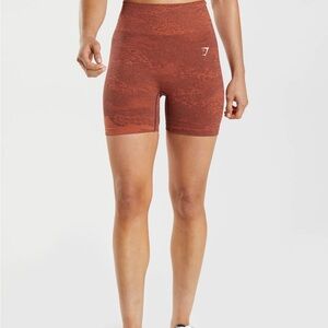 Gymshark Adpat orange camo shorts